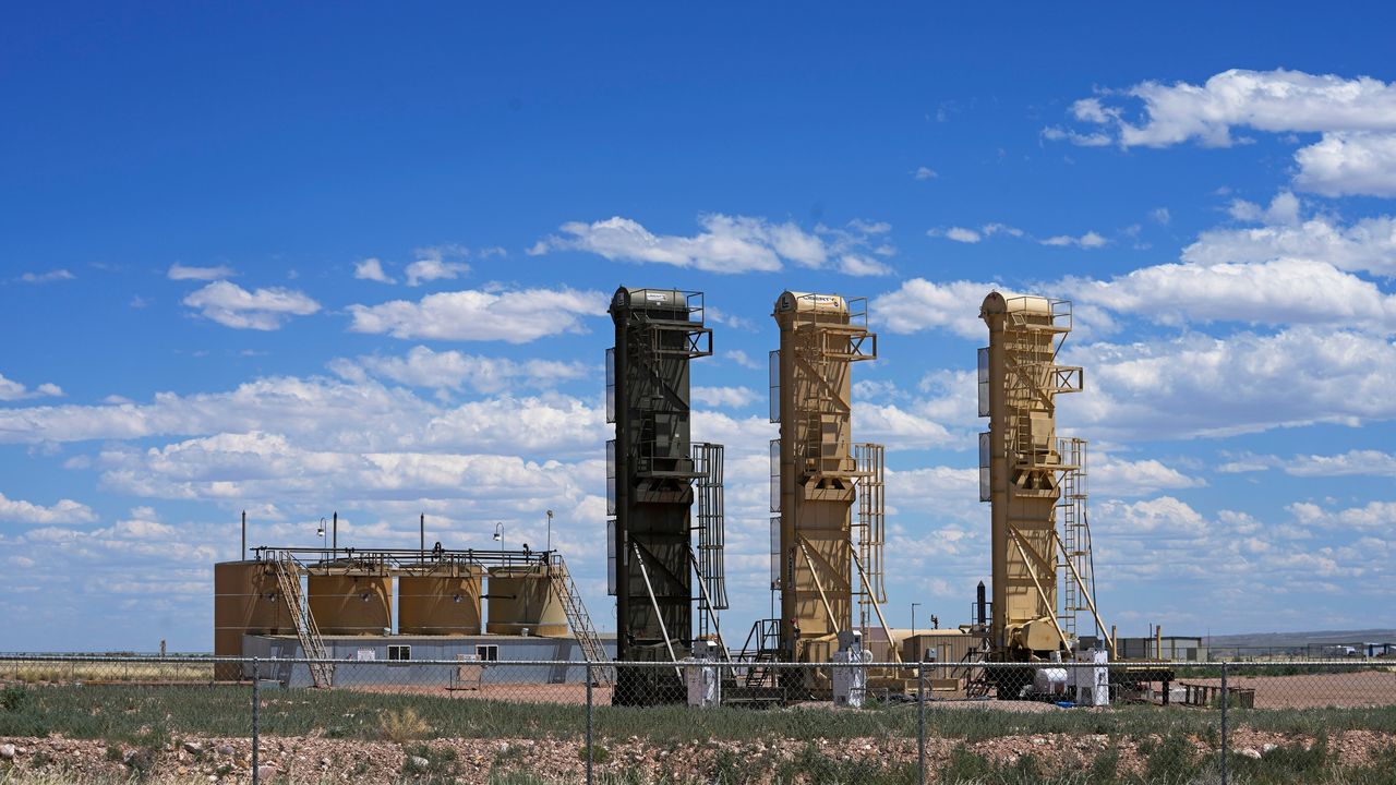 Well pads used for horizontal drilling are seen in the Uinta Basin near Duchesne, Utah, in July.
