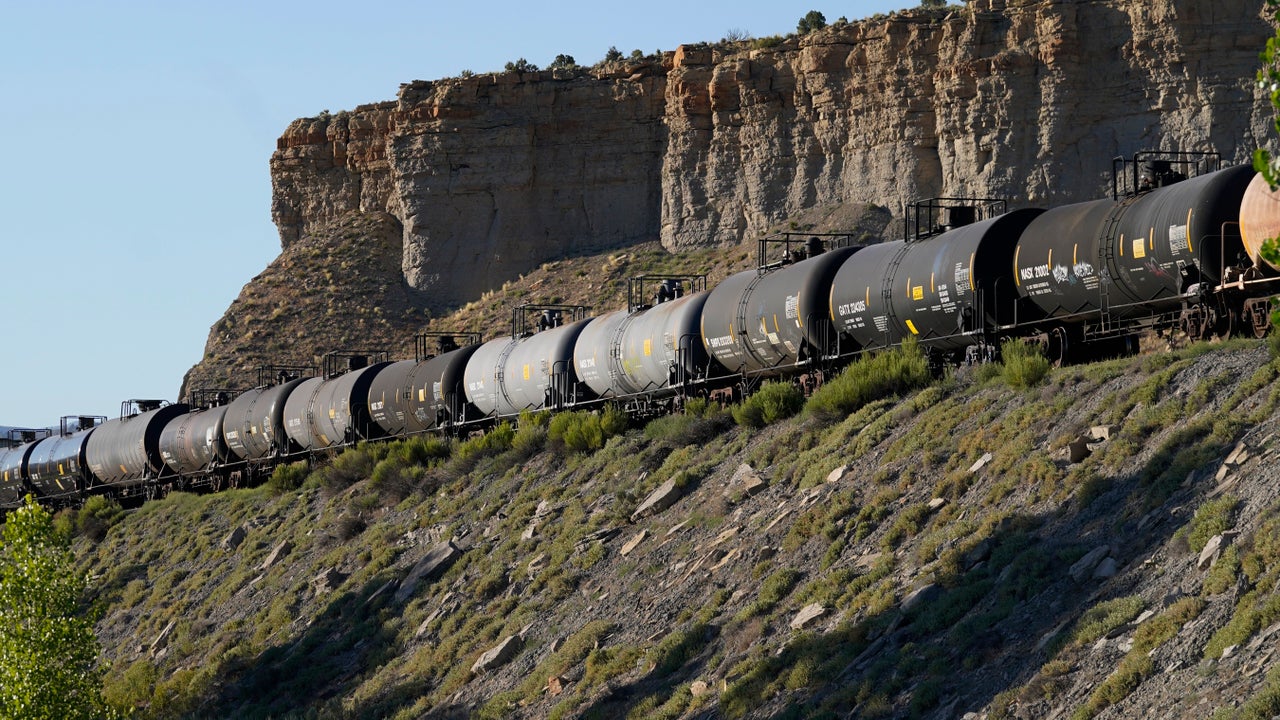 A train hauls oil tanker cars near Price, Utah. The proposed Uinta Basin Railway would connect the remote Uinta Basin to the national rail network, allowing producers an easier way to ship crude oil to Gulf Coast refineries.