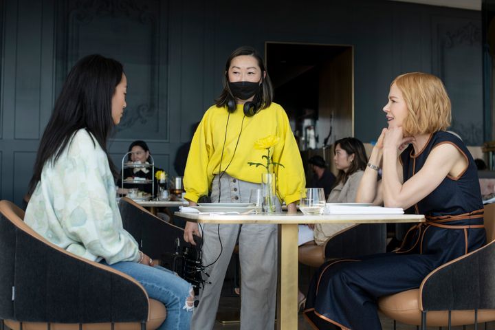 Wang (center) with Yoo and Kidman on the set of "Expats."