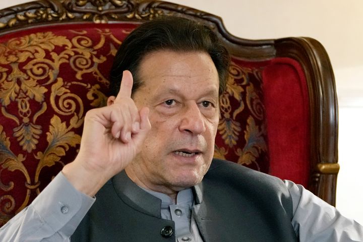 FILE - Pakistan's former Prime Minister Imran Khan gestures during talk with reporters regarding the current political situation and the ongoing cases against him at his residence, in Lahore, Pakistan, Thursday, Aug. 3, 2023. Khan awoke Sunday, Aug. 6, 2023, as an inmate in a high-security prison after a court handed him a three-year jail sentence for corruption, a development that could end his future in politics. (AP Photo/K.M. Chaudary, File)