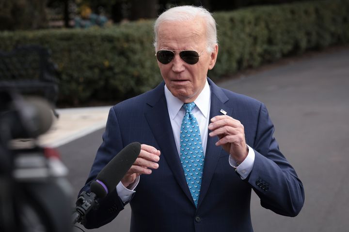 President Joe Biden answers questions while departing the White House on Jan. 30. He addressed Donald Trump's ballot issues, according to a member of the press corps.