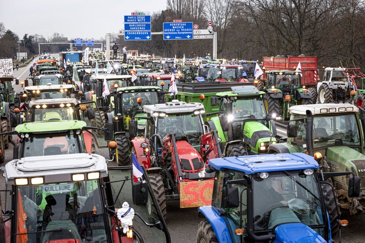Farmers take part in a protest called by local branches of major farmer unions FNSEA and Jeunes Agriculteurs, blocking the A35 highway with tractors near Strasbourg on Jan. 30.