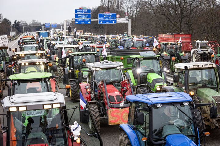 Farmers take part in a protest called by local branches of major farmer unions FNSEA and Jeunes Agriculteurs, blocking the A35 highway with tractors near Strasbourg on Jan. 30. 