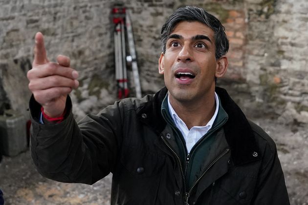 Rishi Sunak gestures as he visits the village of Bainbridge to meet constituents involved in the renovation of a former chapel in North Yorkshire.