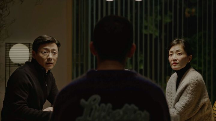 Lin Muran as Tu Wei (center), and Zu Feng (left) and Guo Ke-Yu (right) as his parents in “Brief History of a Family.”