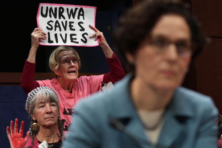 WASHINGTON, DC - JANUARY 30: Demonstrators stage a protest during a hearing before the Subcommittee on Oversight and Accountability of House Foreign Affairs Committee at the U.S. Capitol on January 30, 2024 in Washington, DC. The subcommittee held a hearing titled “UNRWA Exposed: Examining the Agency’s Mission and Failures.” (Photo by Alex Wong/Getty Images)