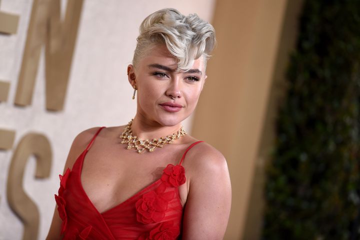 Florence Pugh attends the 81st Annual Golden Globe Awards on Jan. 7, 2024. She shared an awkward moment from the set of "Oppenheimer" during a panel last year.