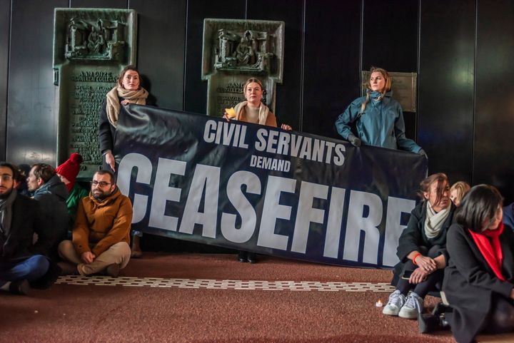 Government workers in the Netherlands take part in a silent sit-in outside the Ministry of Foreign Affairs on Dec. 21 to show their dissatisfaction with the attitude of the outgoing cabinet toward Israeli's assault on Gaza.