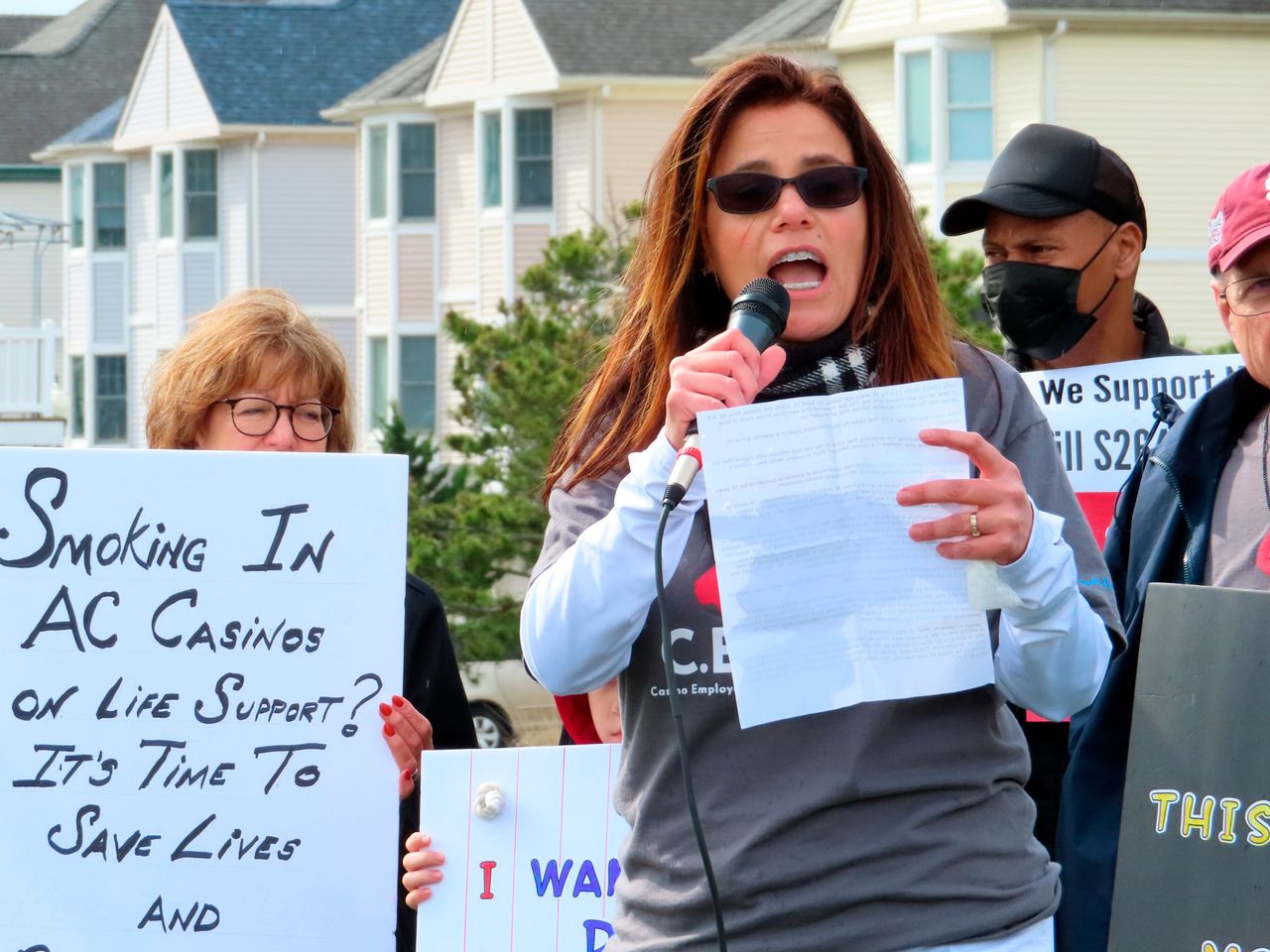 Nicole Vitola, a dealer at the Borgata casino, speaks at a rally to ban smoking in April 2022. Vitola became outspoken on the issue when the state rescinded a temporary smoking ban implemented during the pandemic.