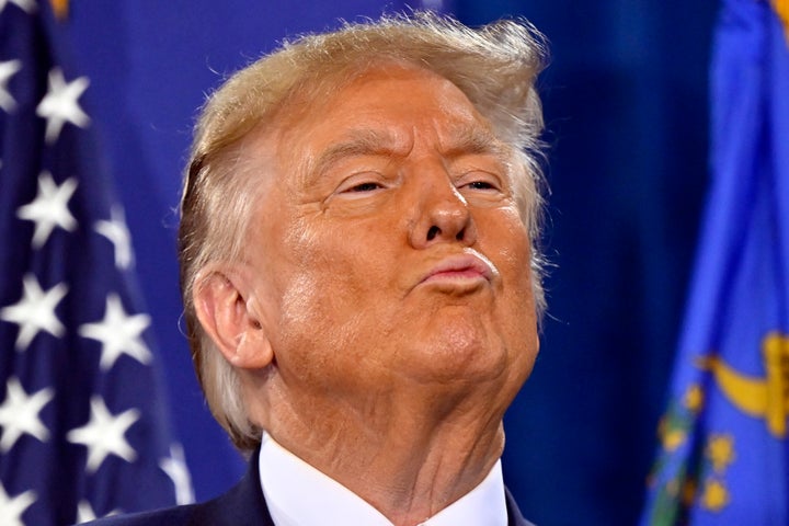 Republican presidential candidate and former President Donald Trump stands on stage during a campaign event at Big League Dreams Las Vegas on Jan. 27, 2024, in Las Vegas.