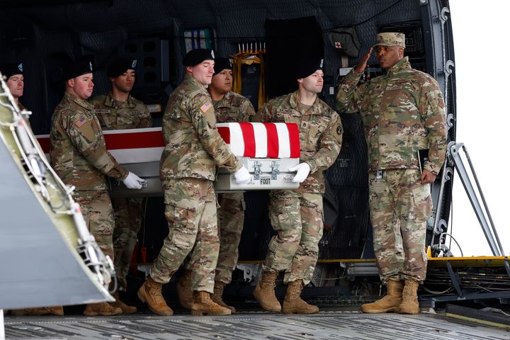 DOVER, DELAWARE - FEBRUARY 02: A U.S. Army carry team moves a flagged draped transfer case containing the remains of Army Sgt. Kennedy Sanders during a dignified transfer at Dover Air Force Base on February 02, 2024 in Dover, Delaware. U.S. Army Sgt. William Rivers, Sgt. Breonna Moffett, Sgt. Kennedy Sanders were killed in addition to 40 others troops were injured during a drone strike in Jordan. (Photo by Kevin Dietsch/Getty Images)