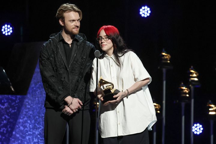 Finneas and Billie Eilish on stage at the Grammys
