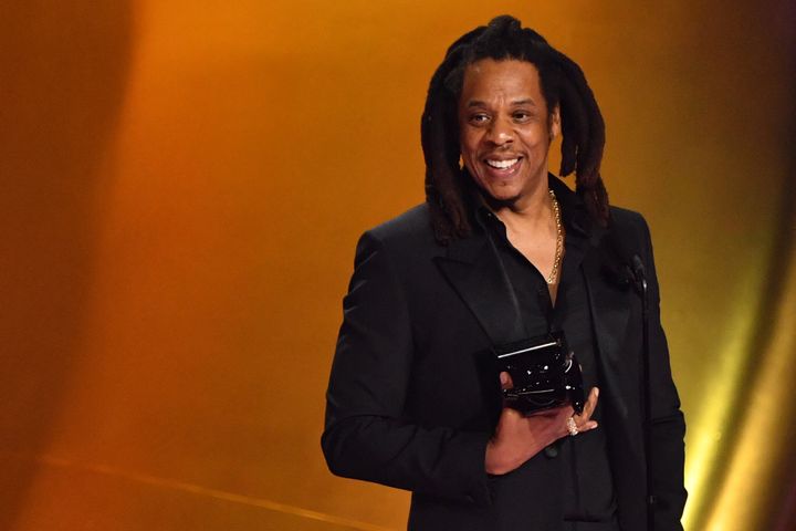 Jay-Z collects the Global Impact Award at the Grammys
