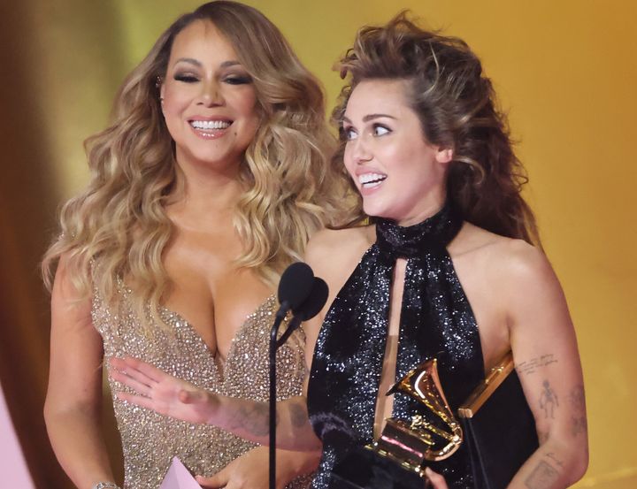 Miley Cyrus was presented with her first ever Grammy by Mariah Carey on Sunday night