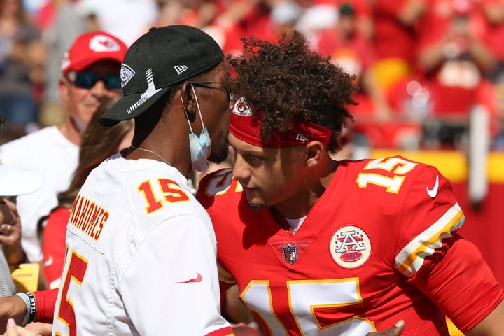 Kansas City Chiefs quarterback Patrick Mahomes (15) hugs his dad before an AFC West matchup between the Los Angeles Chargers and Kansas City Chiefs on Sep 26, 2021.