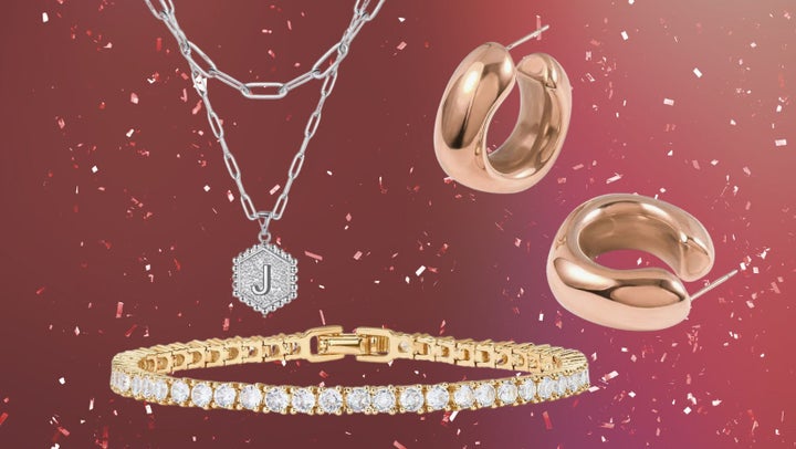 A gold-plated tennis bracelet, dainty initial necklace and chunky plated-hoops.