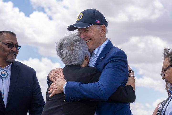 President Joe Biden hugs a supporter after signing a proclamation designating a national monument on Aug. 8, 2023, in Tusayan, Arizona.
