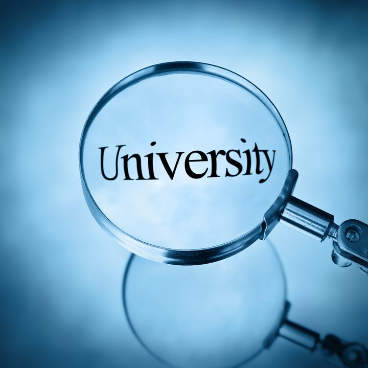 Magnifying glass with the word university magnified in blue square format