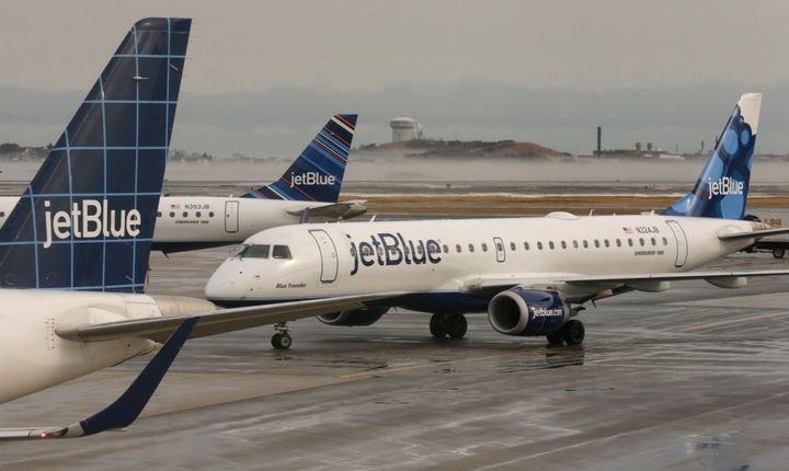 A JetBlue airplane taxis at Boston's Logan International Airport. Recently, two JetBlue airliners collided on the tarmac at the Boston Airport, damaging the aircraft.