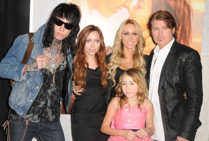 Tish and Billy Ray Cyrus, and their children Trace, Brandi and Noah, arrive at the Los Angeles premiere of "The Last Song" in 2010.