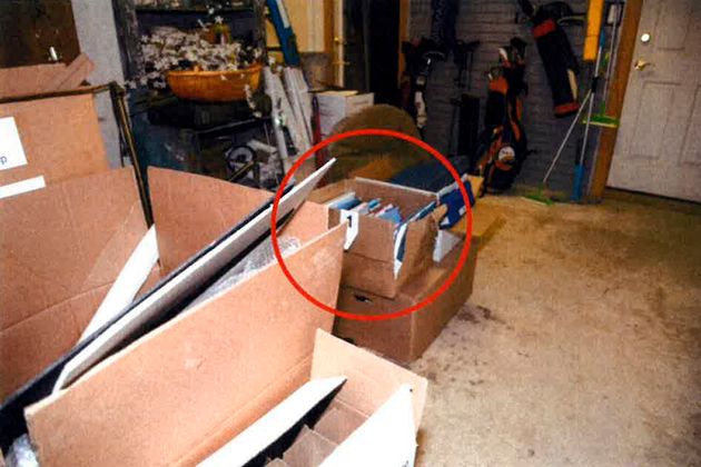 This image, contained in the report from special counsel Robert Hur and annotated by source, shows a damaged box where classified documents were found in President Joe Biden's garage in Wilmington, Delaware.