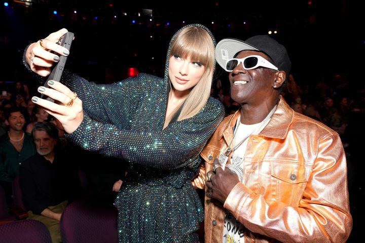 Taylor Swift and Flavor Flav at the iHeartRadio Music Awards on March 27, 2023, in Los Angeles.