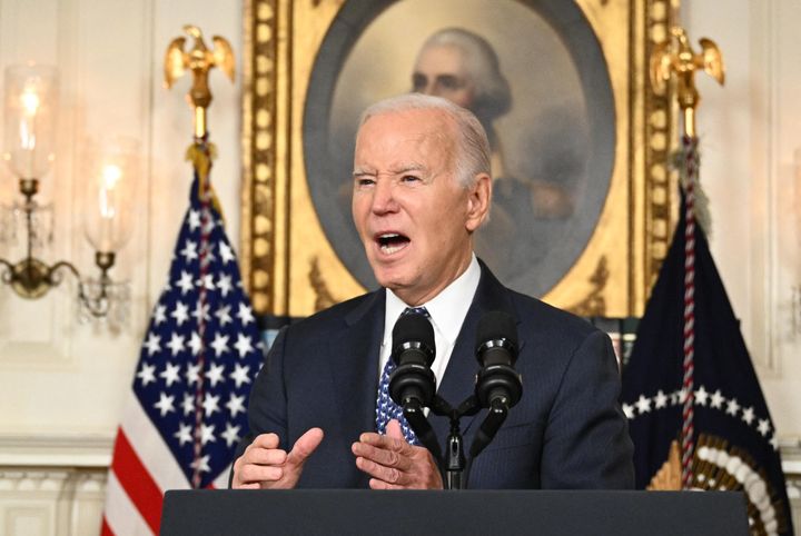 TOPSHOT - US President Joe Biden answers questions about Israel after speaking about the Special Counsel report in the Diplomatic Reception Room of the White House in Washington, DC, on February 8, 2024 in a surprise last-minute addition to his schedule for the day. A long-awaited report cleared President Joe Biden of any wrongdoing in his mishandling of classified documents February 8, but dropped a political bombshell by painting the Democrat as a "well-meaning, elderly man with a poor memory."The report removed a legal cloud hanging over Biden as he seeks reelection in a contest expected to be against Donald Trump -- who is facing a criminal trial for removing large amounts of secret documents after he lost the White House, then refusing to cooperate with investigators. (Photo by Mandel NGAN / AFP) (Photo by MANDEL NGAN/AFP via Getty Images)