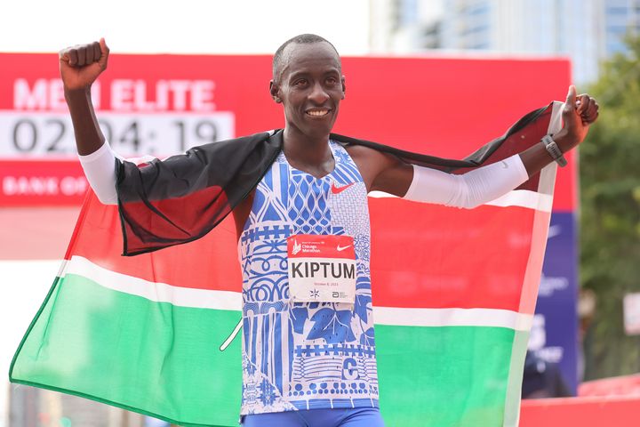 Kelvin Kiptum of Kenya celebrates after winning the 2023 Chicago Marathon professional men's division and setting a world record marathon time of 2:00.35 at Grant Park on October 08, 2023 in Chicago, Illinois. (Photo by Michael Reaves/Getty Images)