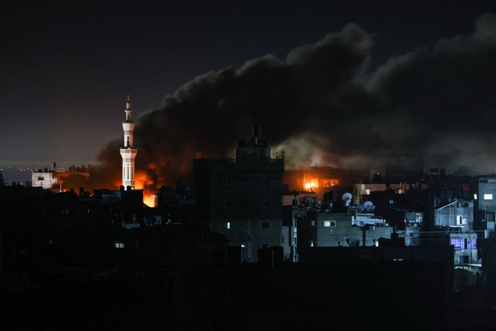 Smoke billows during Israeli bombardment over Rafah in the southern Gaza Strip on February 12, 2024 amid the ongoing conflict between Israel and the Palestinian Hamas militant group. A series of Israeli air strikes on the southern Gaza town of Rafah on February 12, 2024 killed 52 people, according to the Hamas-ruled territory's health ministry. (Photo by SAID KHATIB/AFP via Getty Images)