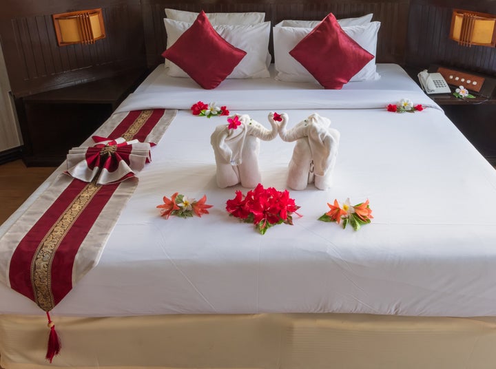 Empty beds in a modern hotel room for a happy weekend