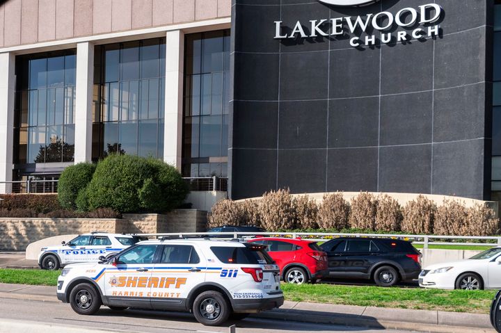 Emergency vehicles are seen outside Lakewood Church in Houston during an active shooter event on Sunday, Feb. 11.