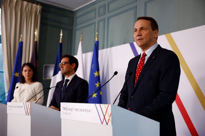 German Foreign Minister Annalena Baerbock, French Foreign and European Affairs Minister Stephane Sejourne and Polish Foreign Minister Radoslaw Sikorski (L to R) attend a joint press conference near Paris on February 12, 2024.