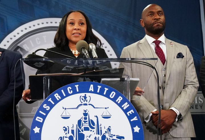 Fulton County District Attorney Fani Willis speaks alongside special prosecutor Nathan Wade at an Aug. 14, 2023, news conference at the Fulton County Government Center in Atlanta.
