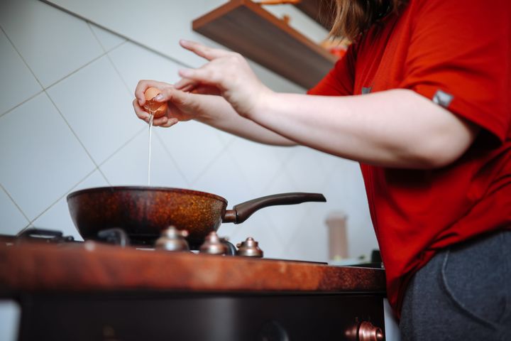 Teen Independently Cooking a Healthy Breakfast at Home.