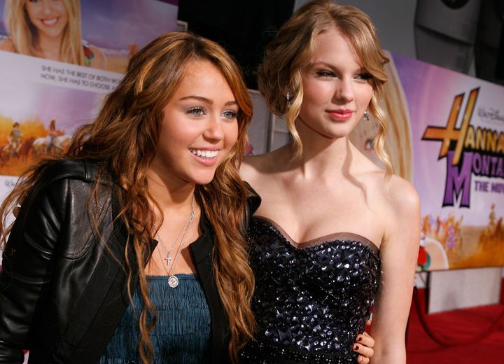 Miley Cyrus and Taylor at the premiere of Hannah Montana: The Movie in 2009