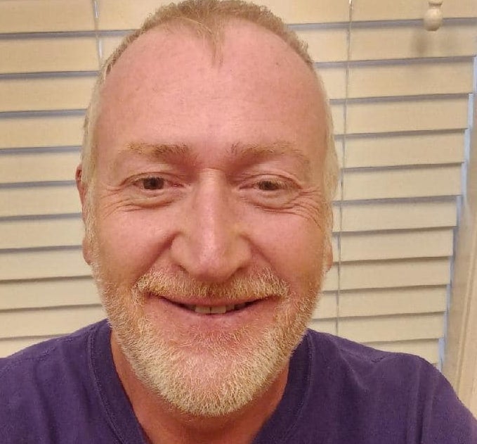 John Walter Lay of Tampa, Florida, shown in a photo posted on Facebook, had told friends he was being threatened. qhiukiqrihtinv