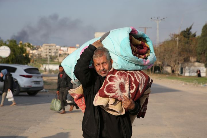 Palestinians fleeing the Israeli offensive on Khan Younis arrive at Rafah, Gaza Strip, on Feb. 14, 2024.