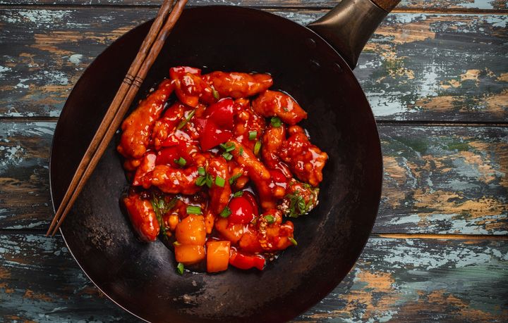 A look at the "nuclear-red candy glaze" on sweet and sour pork.