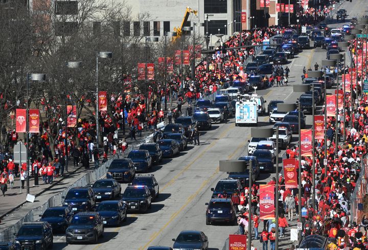 Law enforcement vehicles line Grand Boulevard after responding to a shooting at Union Station during the Kansas City Chiefs Super Bowl LVIII victory parade Wednesday, Feb. 14, 2024, in Kansas City, Missouri. (Chris Ochsner/The Kansas City Star/Tribune News Service via Getty Images)