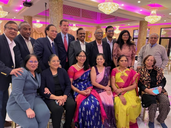 Suozzi (standing, fourth from left) courted the South Asian community as well as the East Asian community.