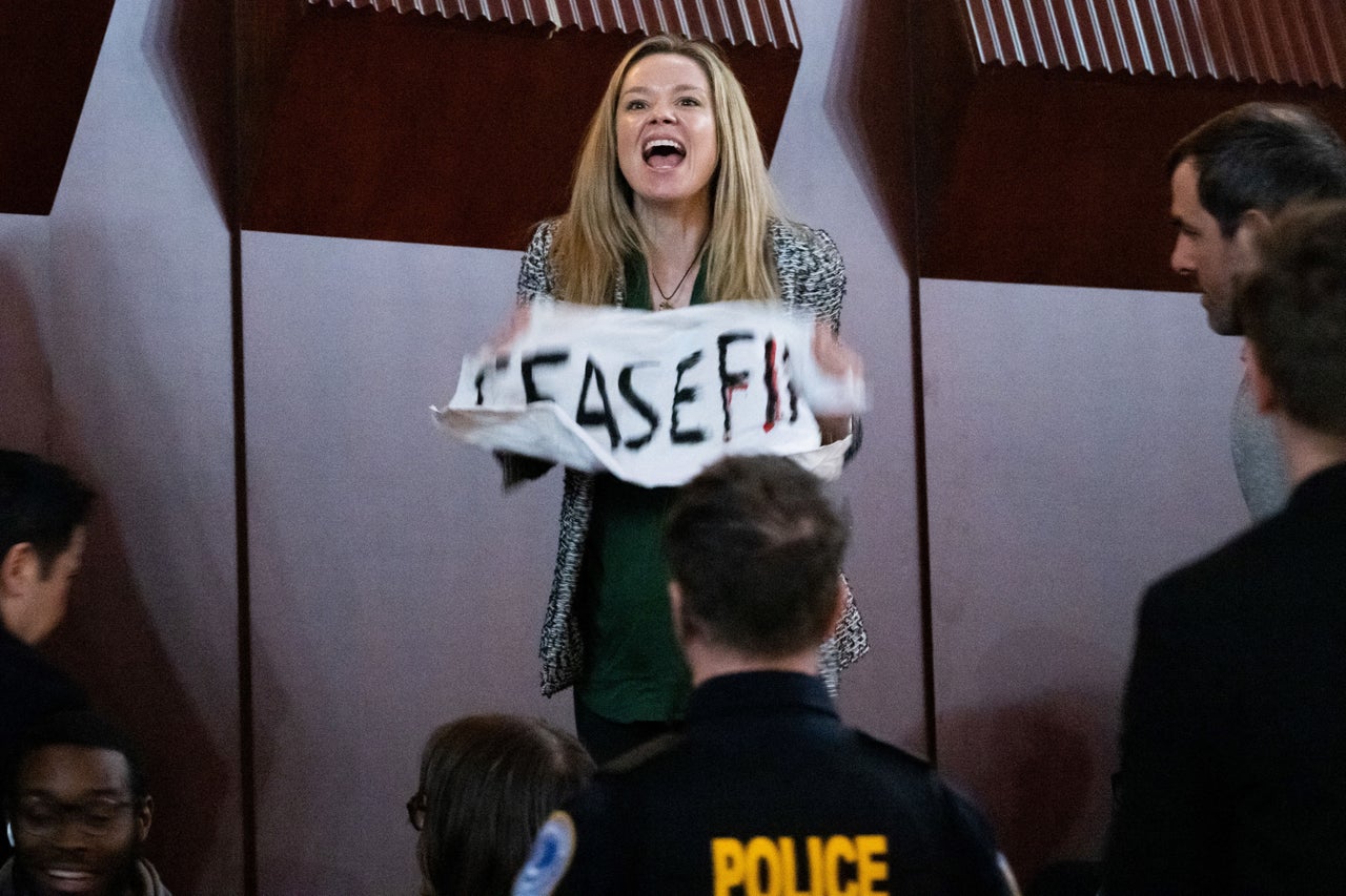 A protester shouts in support of the people of Gaza as President Joe Biden speaks at a "Restore Roe" campaign rally on Jan. 23 in Manassas, Virginia.