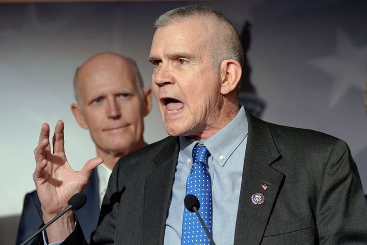 Rep. Matt Rosendale (R-Mont.), right, speaks at a Jan. 10 news conference on border security and funding on Capitol Hill as Sen. Rick Scott (R-Fla.) listens.