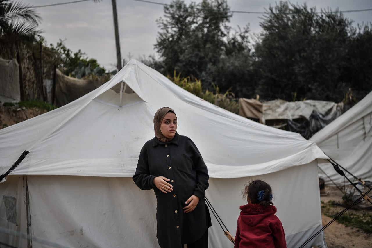 24 year-old Rua al-Sindavi, a Palestinian woman pregnant with triplets, expects to give birth in a tent due to insufficient medical facilities. She recently had to migrate to Rafah due to Israeli attacks on February 14, 2024. Sindavi suffers from malnutrition and extreme anaemia due to the food shortages in the city. 