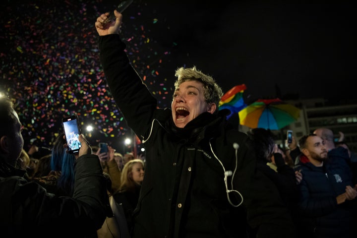 A supporter of the same-sex marriage bill, celebrates the legislation's passage during a rally at central Syntagma Square, in Athens, Greece, on Feb. 15, 2024. 