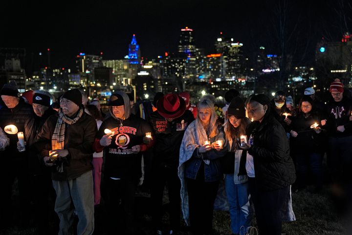 People attend a candlelight vigil for victims of a shooting at a Kansas City Chiefs Super Bowl victory rally on Feb. 15, 2024 in Kansas City, Missouri.