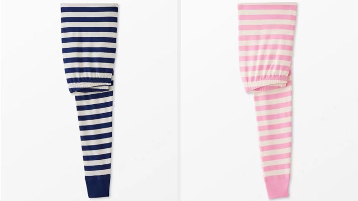 Two pairs of the iconic Hanna Andersson striped pajamas.