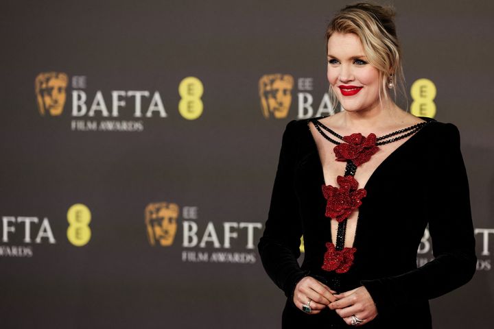 Emerald Fennell on the Baftas red carpet