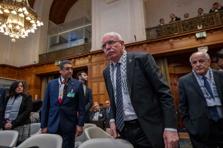 Riad Malki, minister of Foreign Affairs of the Palestinian National Authority, pictured center as six days of hearings opened Monday at the top United Nations court into the legality of Israel’s 57-year occupation of lands sought for a Palestinian state.
