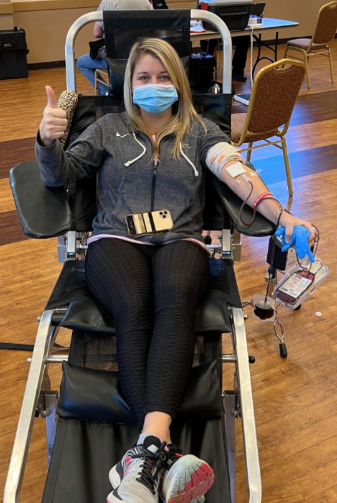 The author donates blood in her sister’s memory as part of their A Pint For Kim movement.