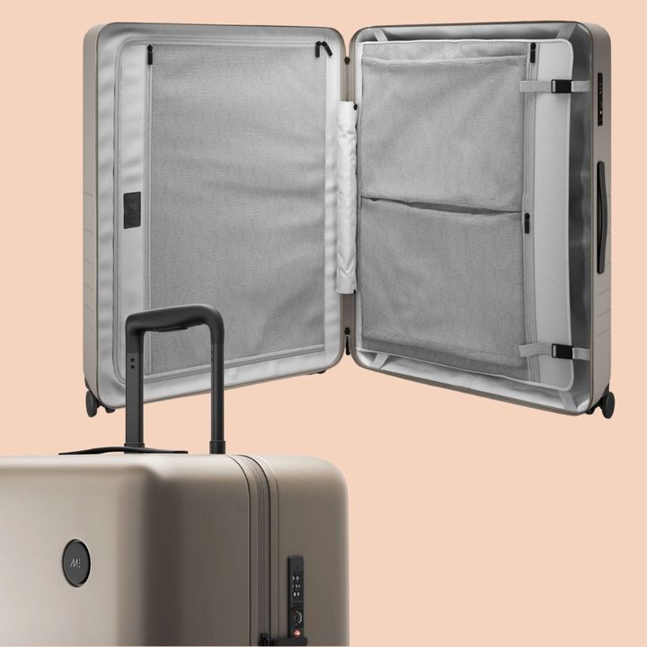 The large check-in suitcase features a double-sided divider for extra organizing potential.